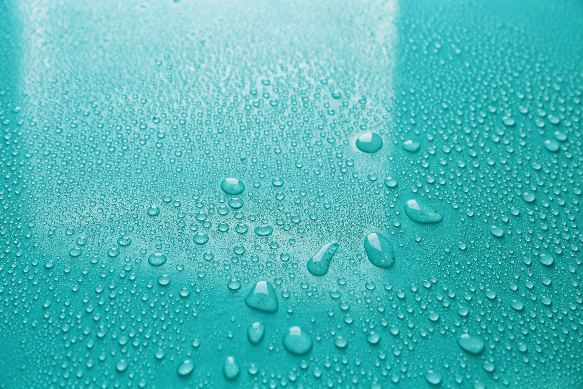 Water Drops on Turquoise Background